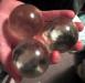 [three clear acrylic balls]